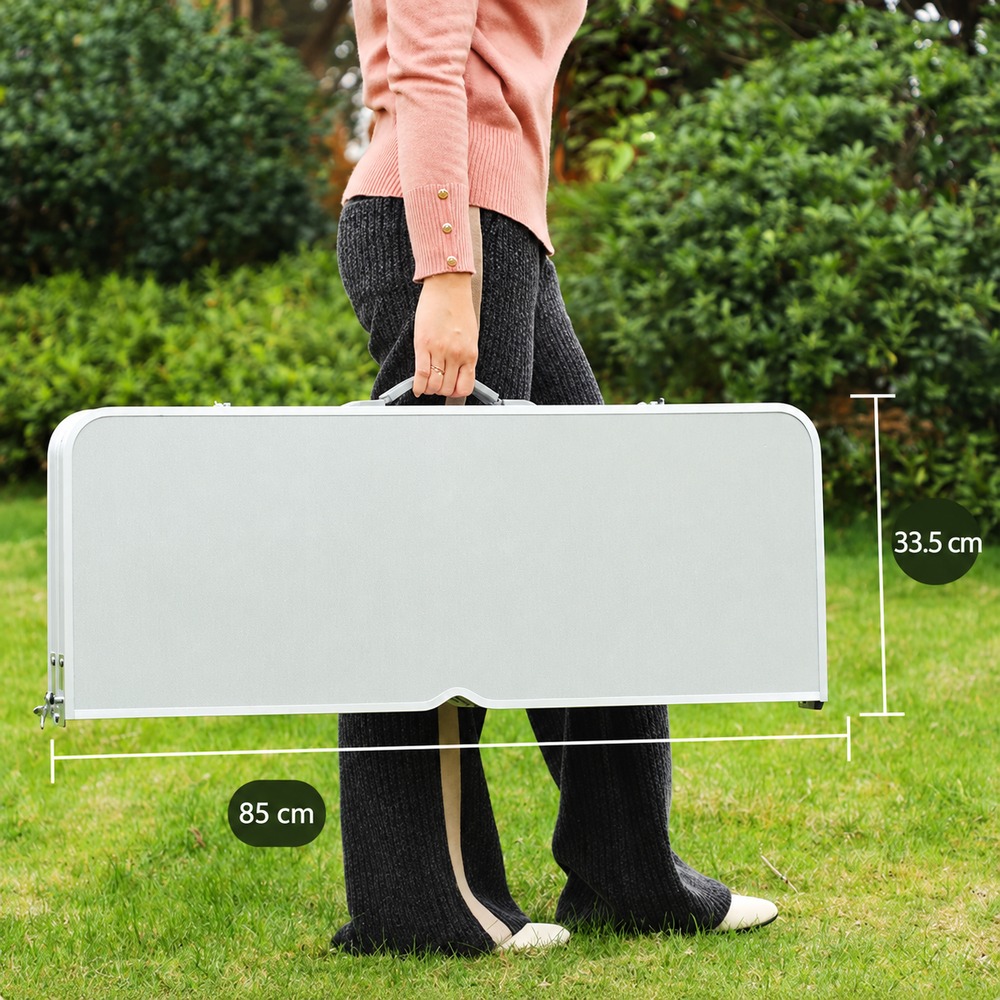 Folded picnic table carried by its handle, case face measuring 85 by 33.5 cm